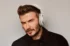 David Beckham wearing Canvas White Px7 S3 headphones