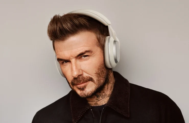 David Beckham wearing Canvas White Px7 S3 headphones